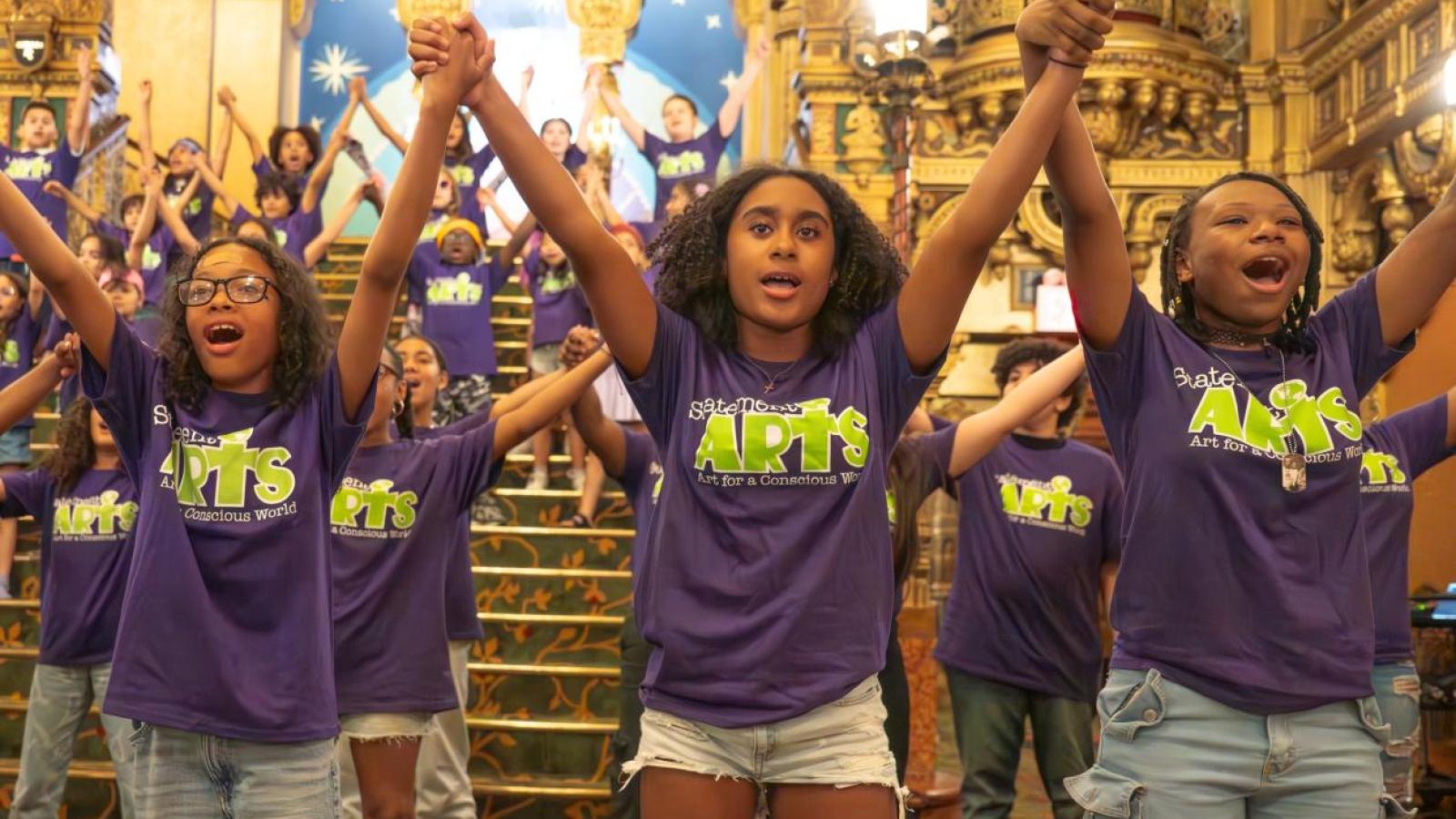 Group of young adults performing